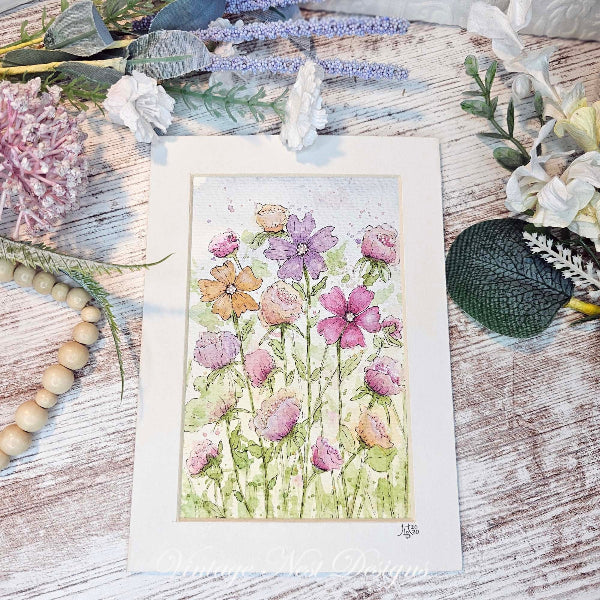 Floral painting on a wooden surface with natural elements