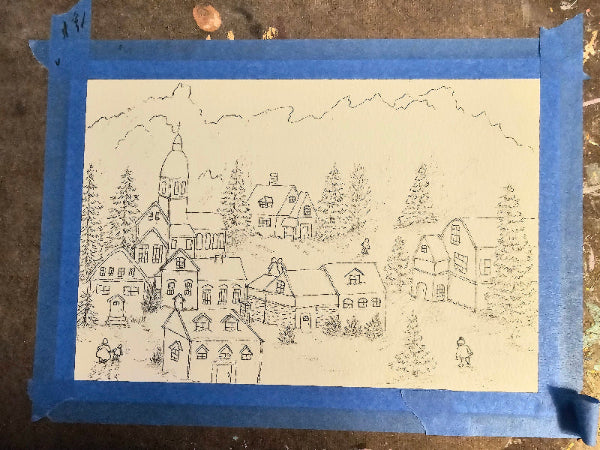 Black and white drawing of a village scene taped to a brown surface