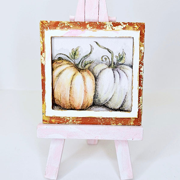 Small painting of two pumpkins on a white background